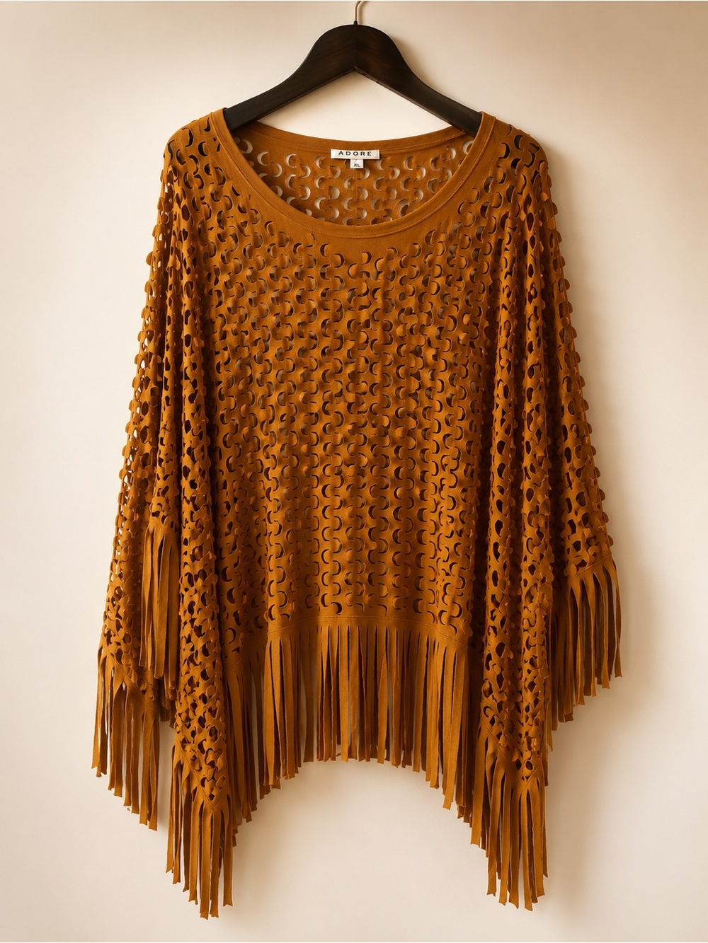 Adore Open-Knit Fringe Poncho in Mustard Brown.
Brand new, never worn, and in be